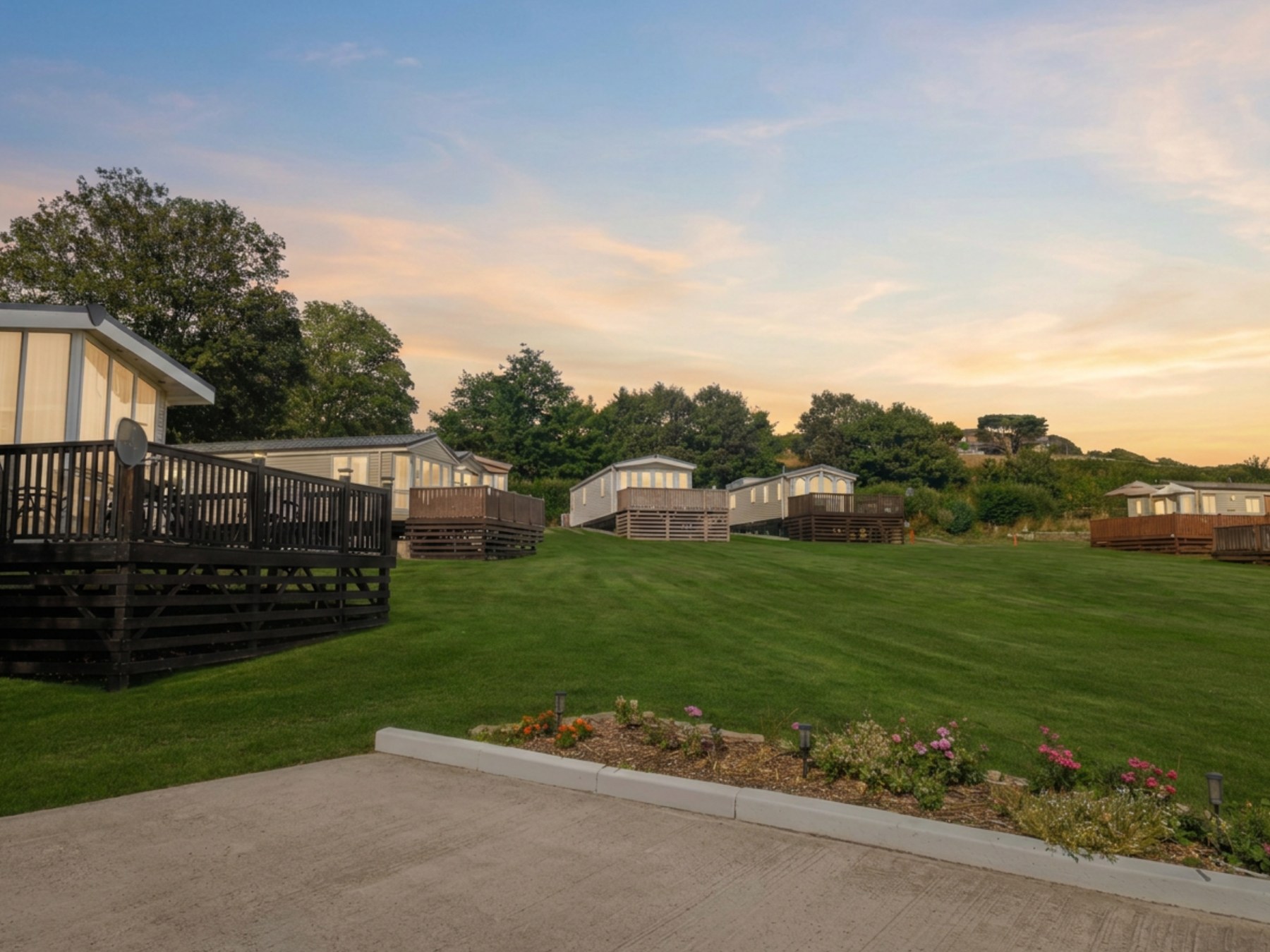 Holiday homes and open green space at Crackwell Holiday Park